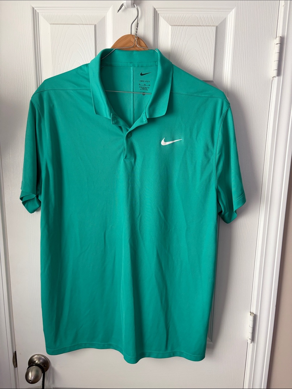 Nike Men’s Teal Polo Shirt with White Swoosh